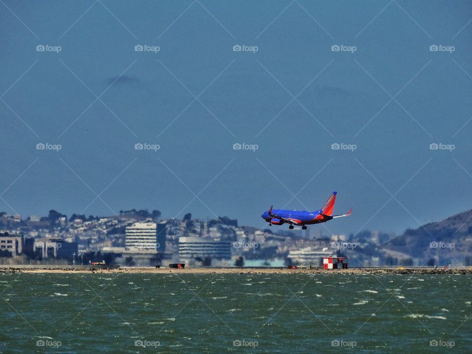 Passenger jet landing at an airport