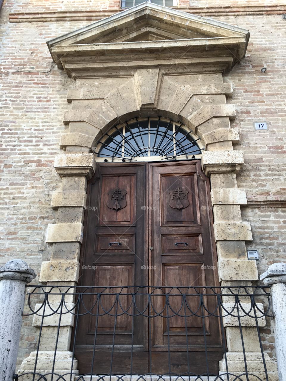Stylish wooden old door, Offida, Italy