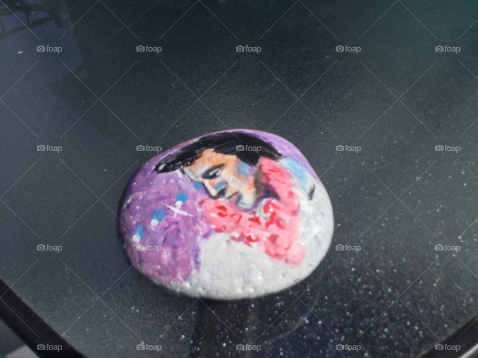 Stone painted with Elvis Presley 
