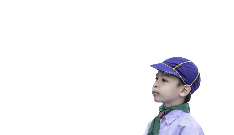 Portrait of a young student wearing a hat on a white background.