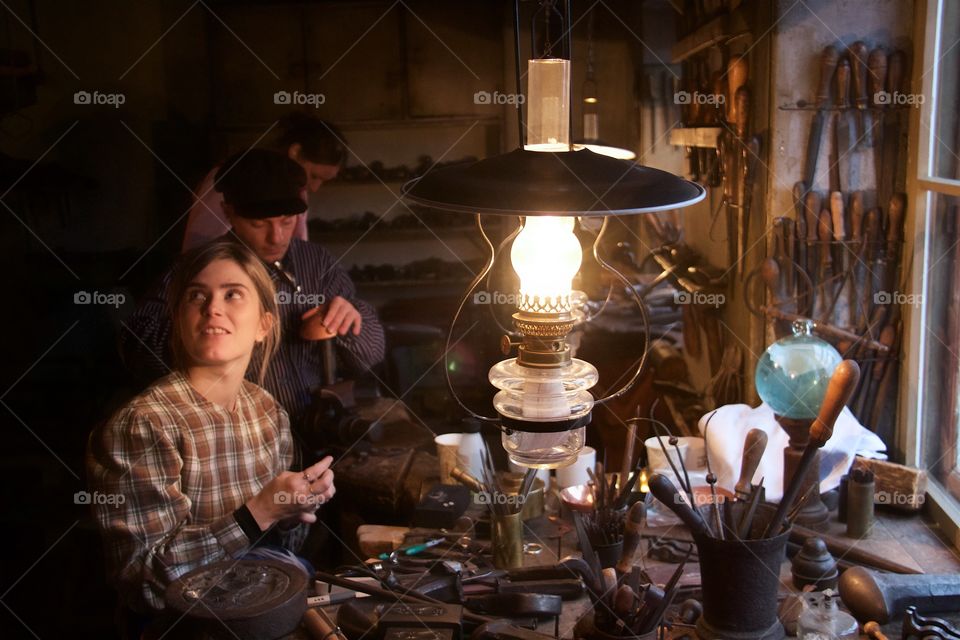 Young woman working with handtools