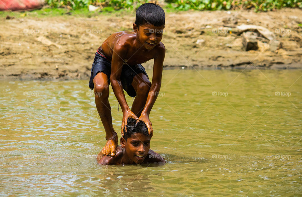 A story of street boys who was enjoying bathing in river to beat the heat of summer #summer