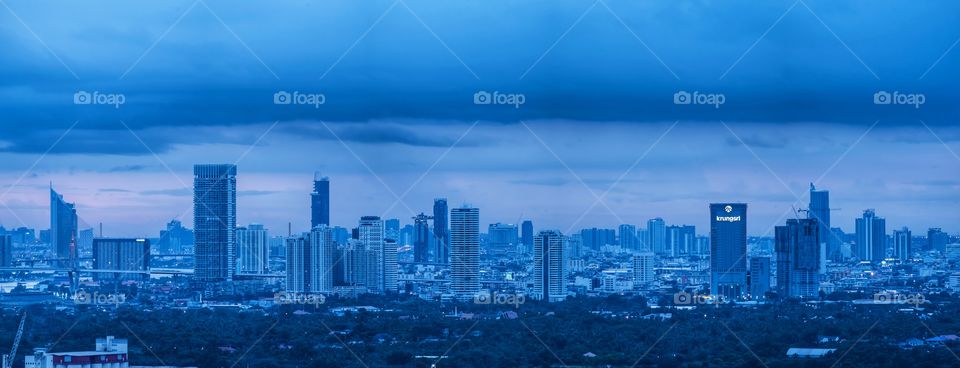 Bangkok skyscraper in the blue mood before rain