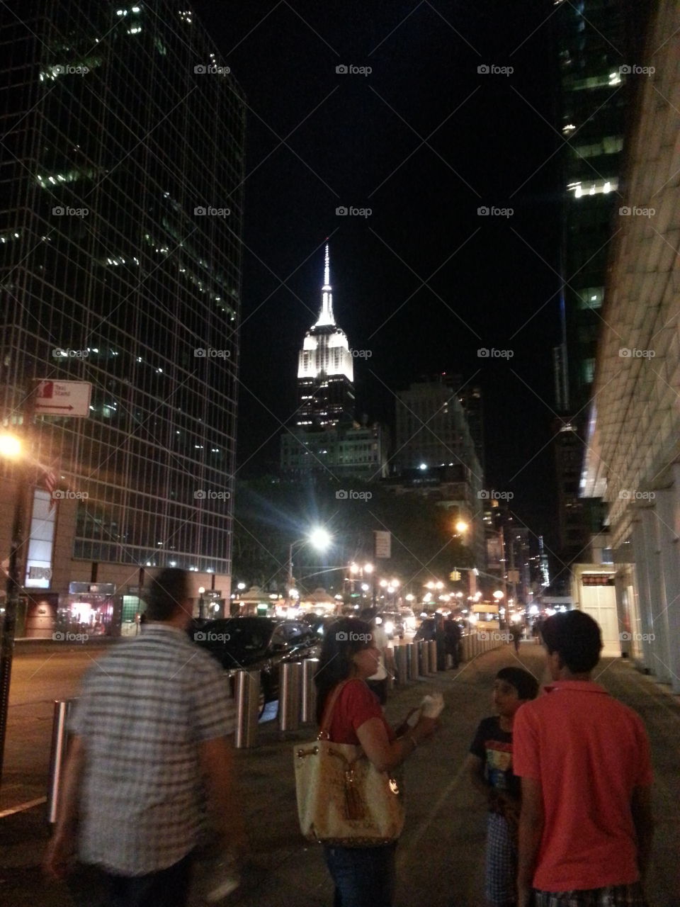 night 🌃 lights. This is a picture of a building that is located in New York city. I took this photo 📷 while I was sight seeing o