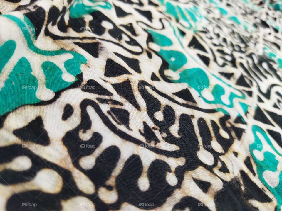 turquoise batik patterned cloth using a very soft materia
