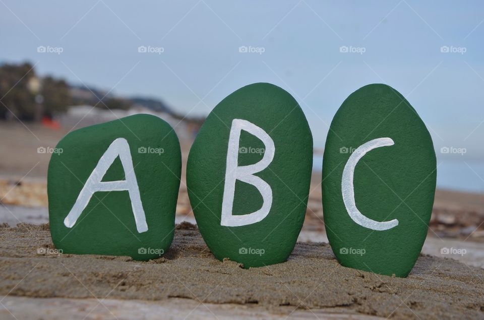 ABC on green stones