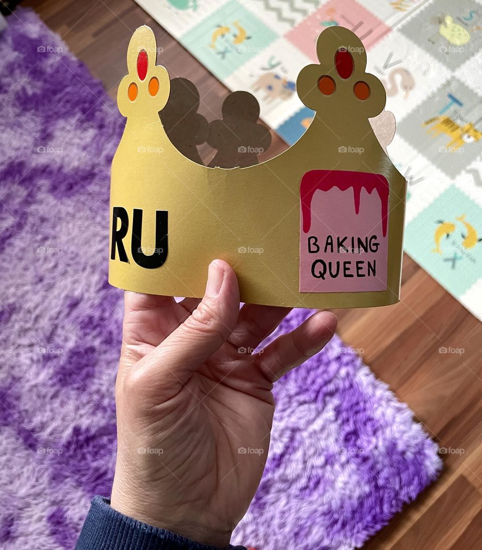 Making crowns for toddlers, baking queen, repurposing Burger King crowns, making crafts with crowns, toddler baking queen 