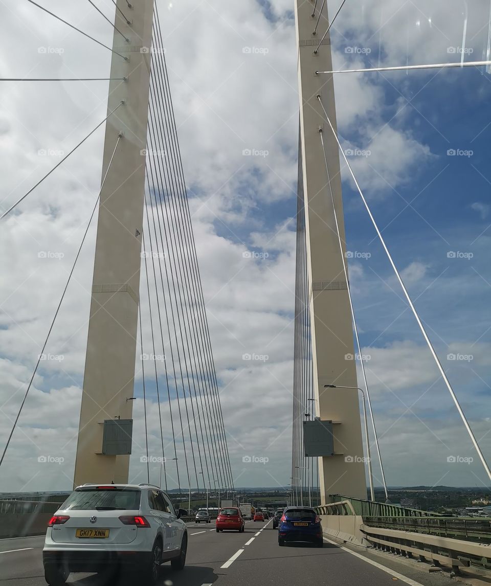 Road traffic on the bridge. Cars on the road. Cars on the way. England.