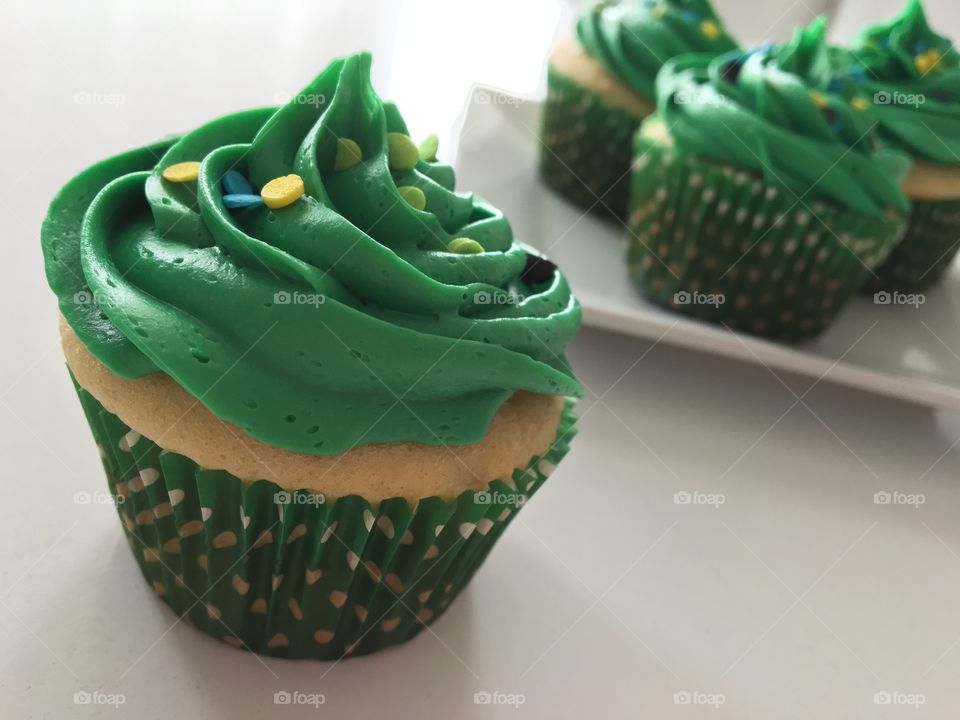 White Cupcakes with Green Buttercream Frosting 