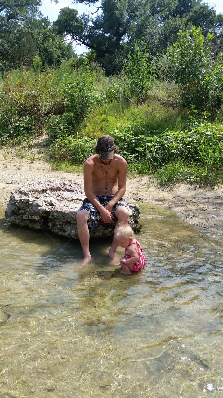 Baby and Daddy in the River