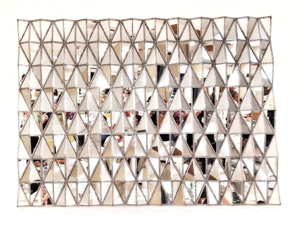 Art-mirror with many triangles and reflections