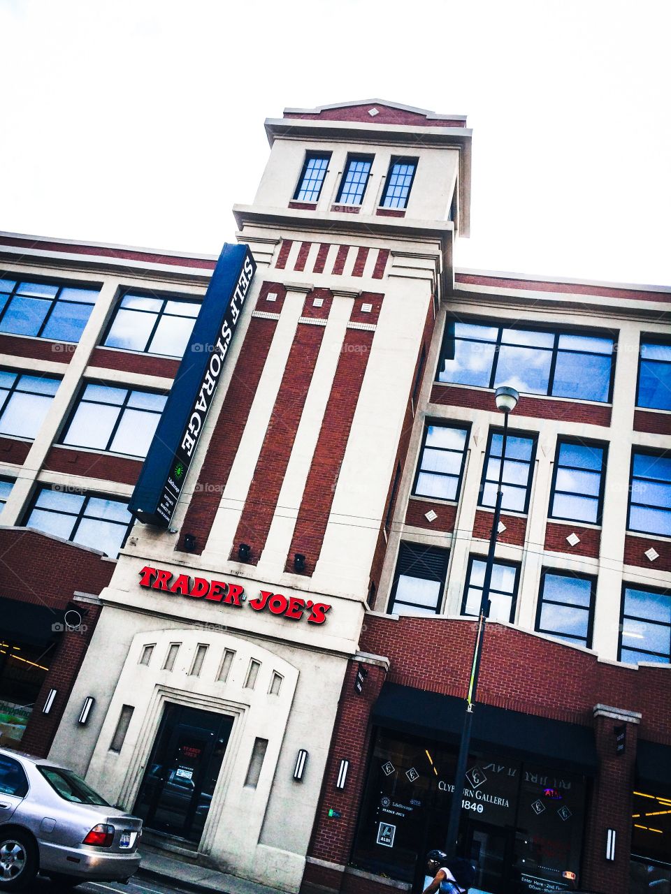 Industrial Rebirth . Manufacturing warehouse repurposed into modern loft residential and retail space. 