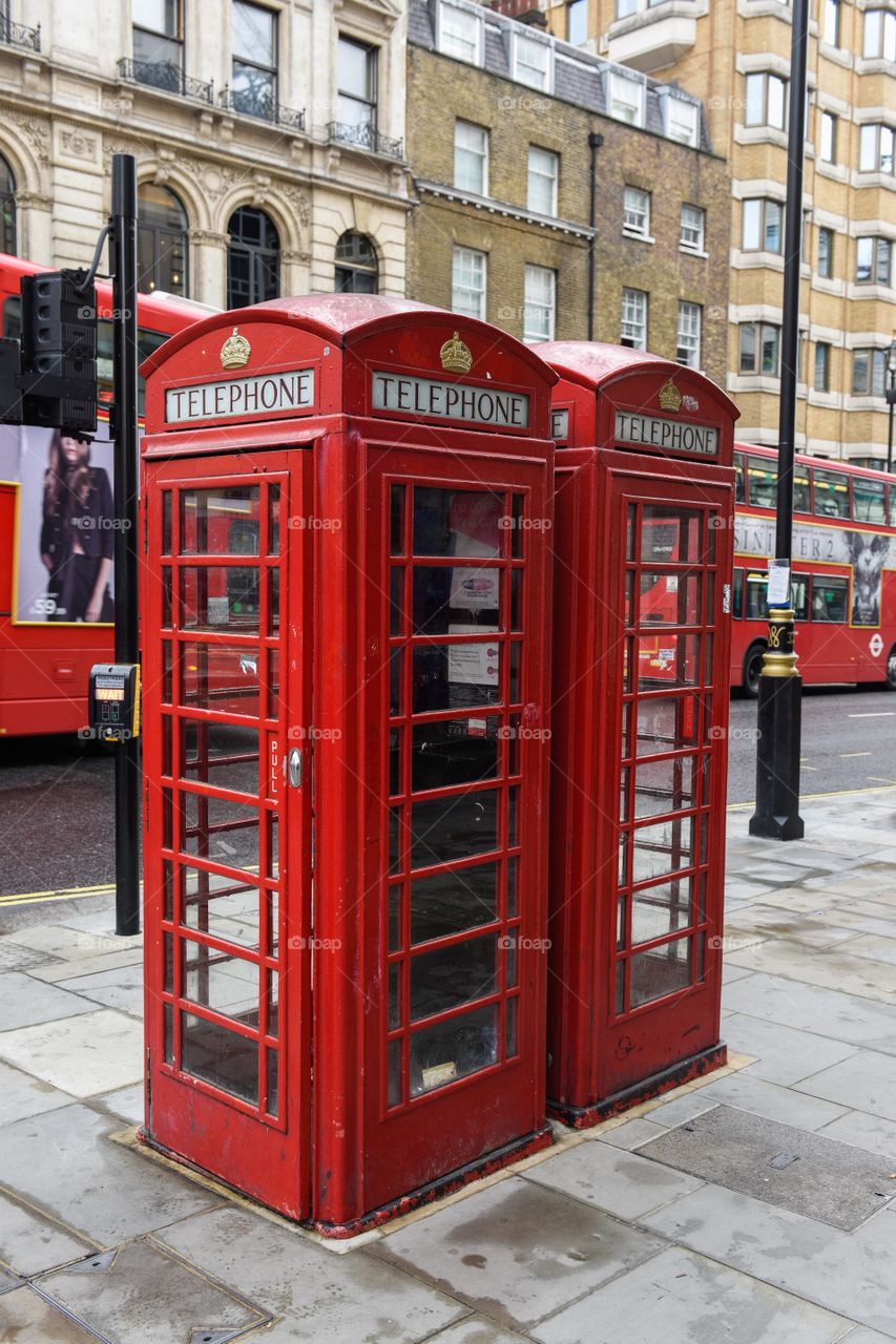 Red telephone booth in near Piccadilly Circus in London.