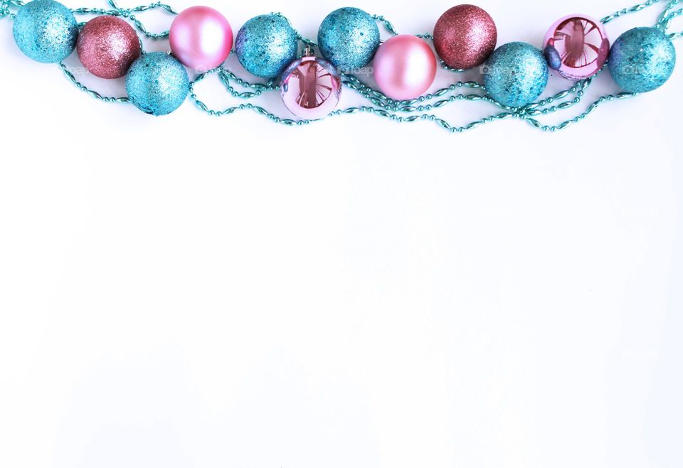 Colorful shiny Christmas balls decoration on white background