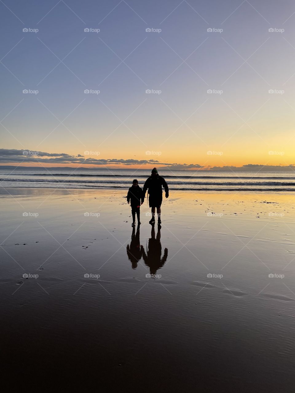 Sunset walk on the beach