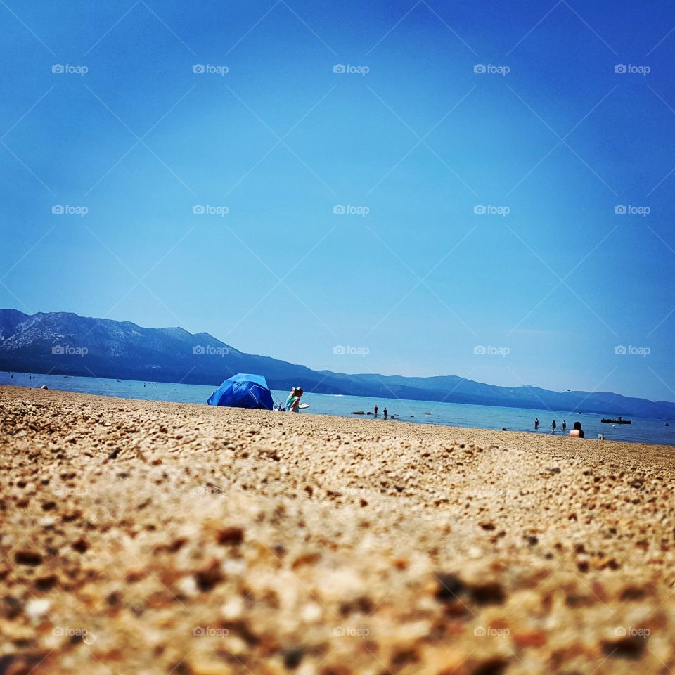 Sandy Beaches 2 Snow Mountains. visited South Lake Tahoe, California in the early summer and the mountains had snow while beach was 85 degrees