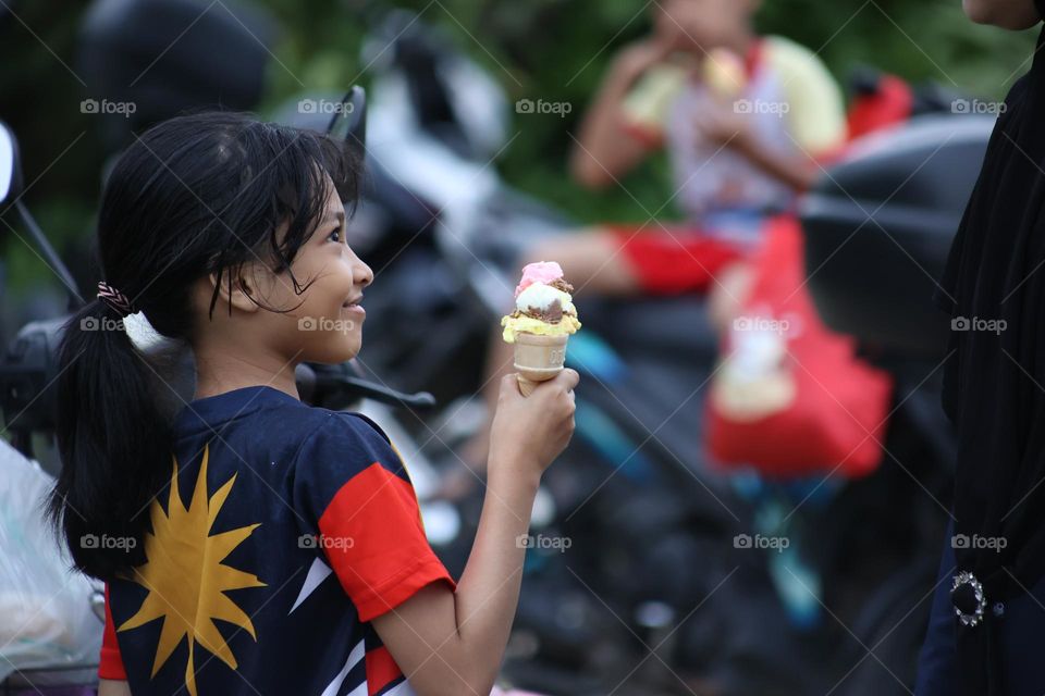 Happy she got an ice cream