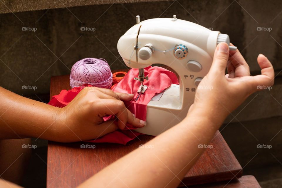 Working at the sewing machine