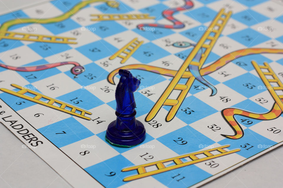 wrong placement by HRD- horse from chess on snake and ladder boardgame