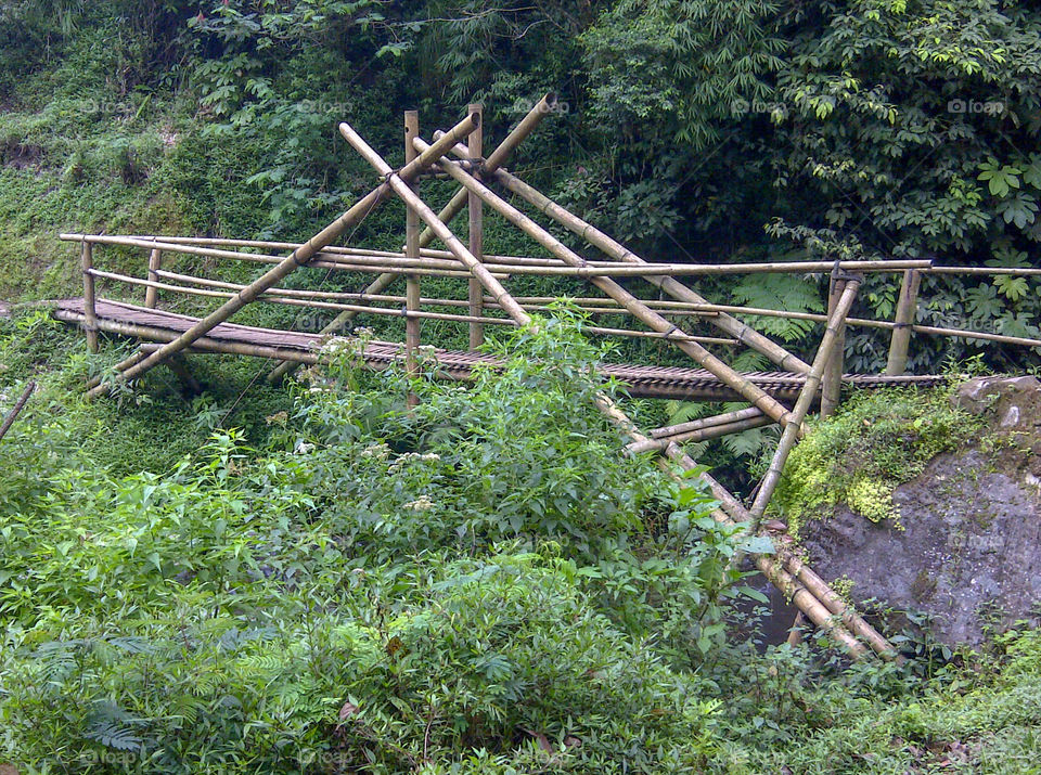 Traditional Bamboo Bridge on Coban Pelangi Waterfall