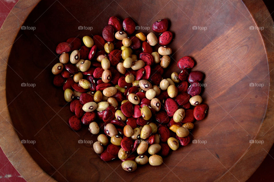 Multi-colored Beans in Wood Bowl