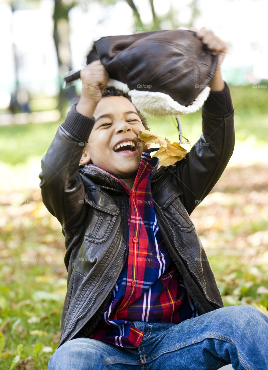 Cute happy boy. Amazing autumn