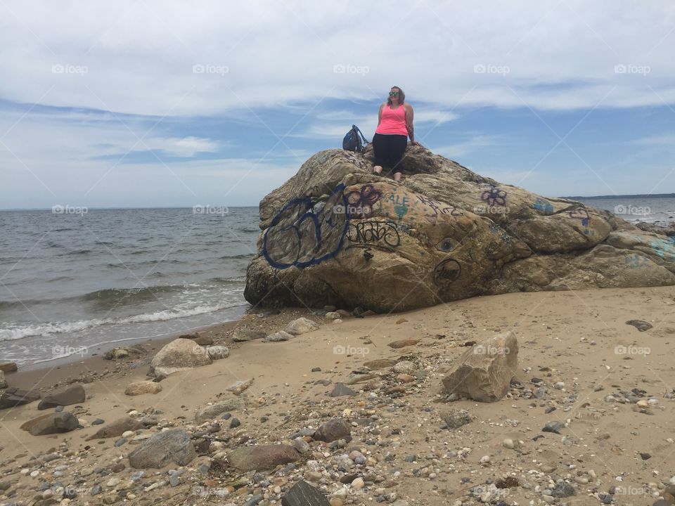 Large graffitied rock at David Weld in Smithtown