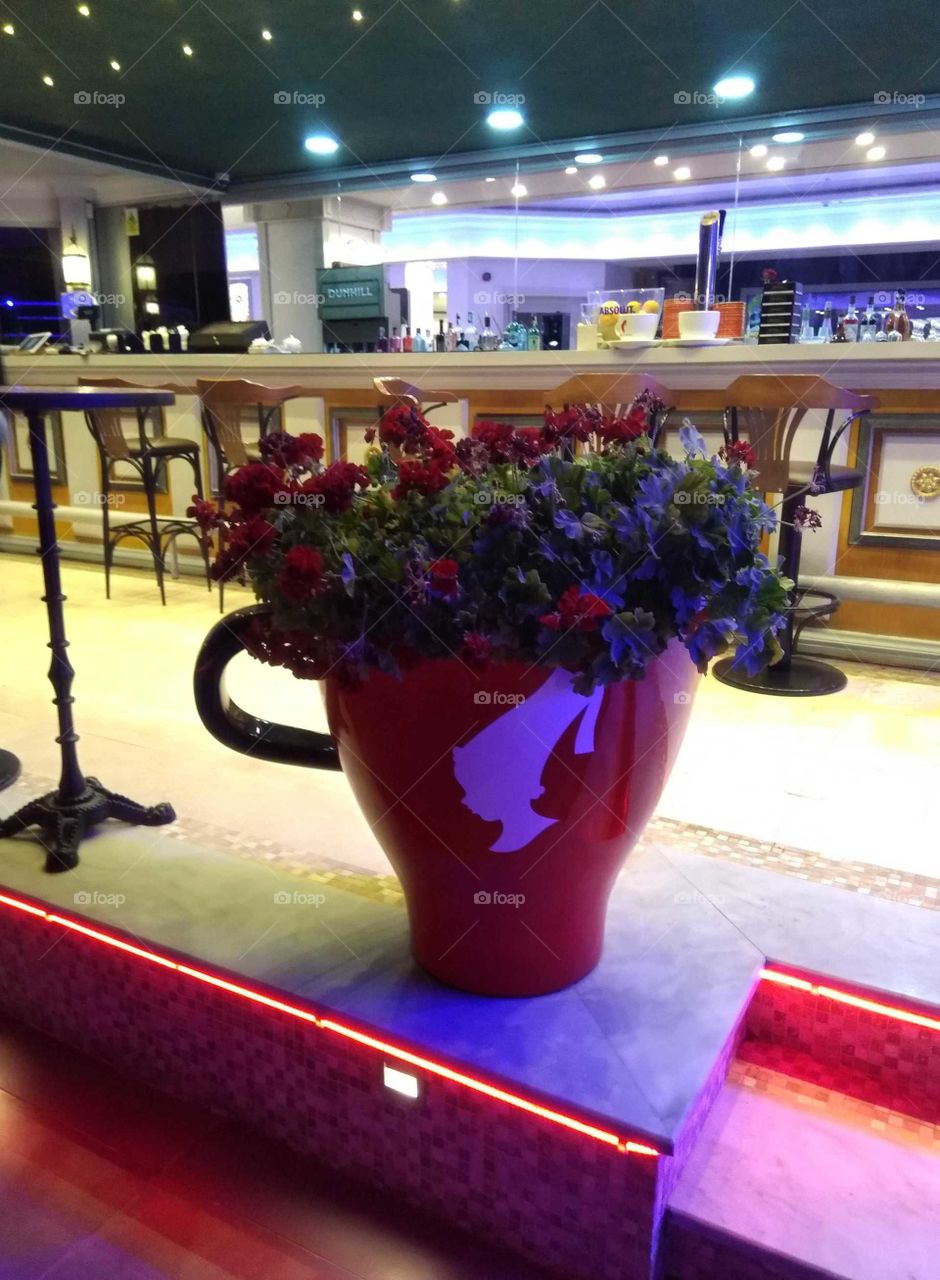 A large cup of flowers