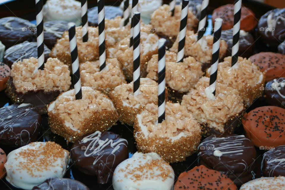 Rice Krispie Treats and Chocolate Covered Oreos and Peanut Butter Crackers