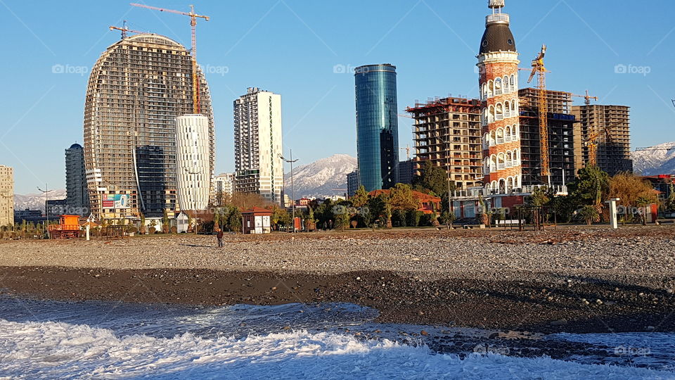 view of the mountains and the city from the sea