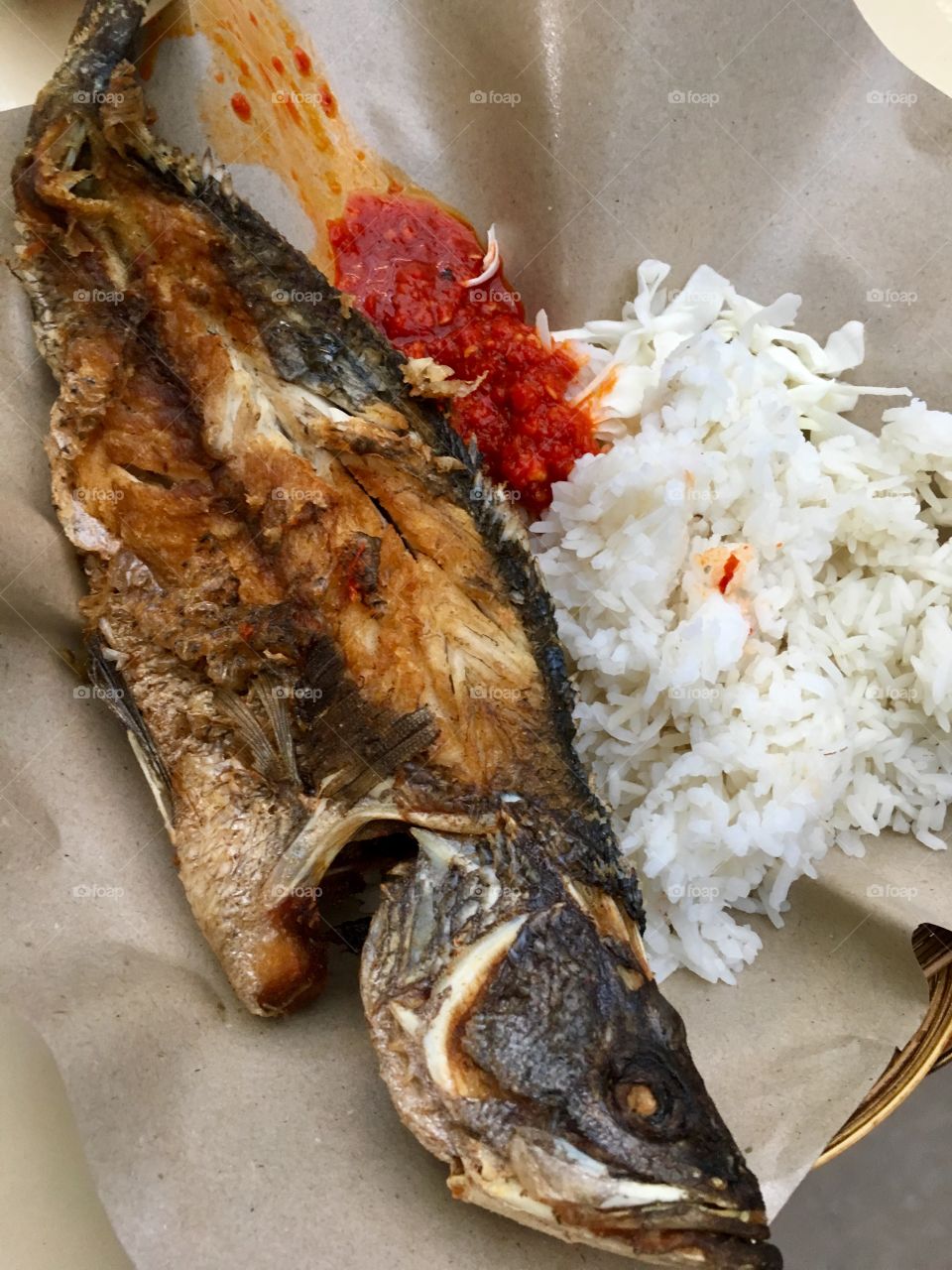 Deep fried sea bass with chilli paste and rice 