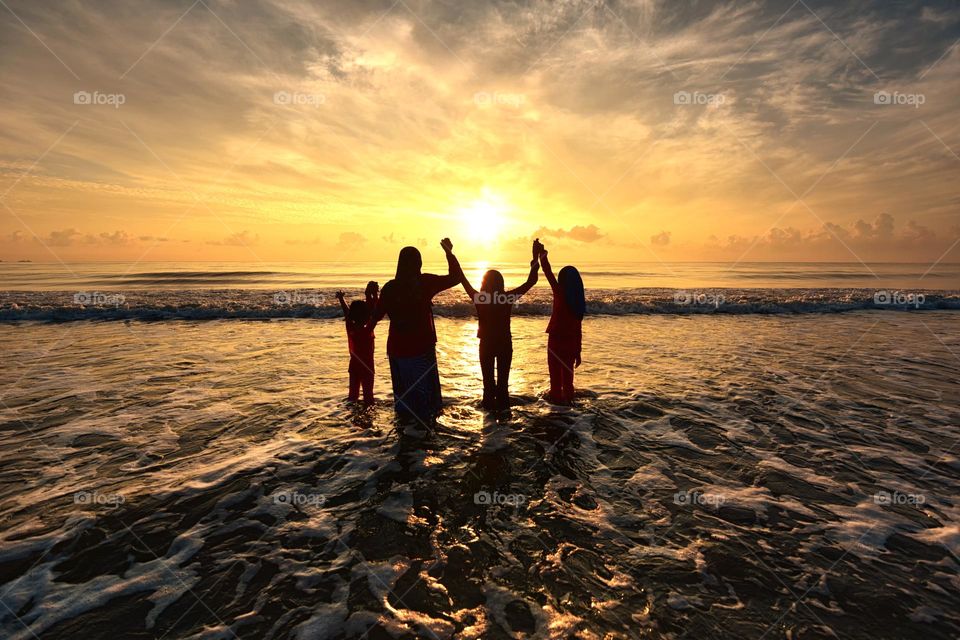 Happy family at the beach