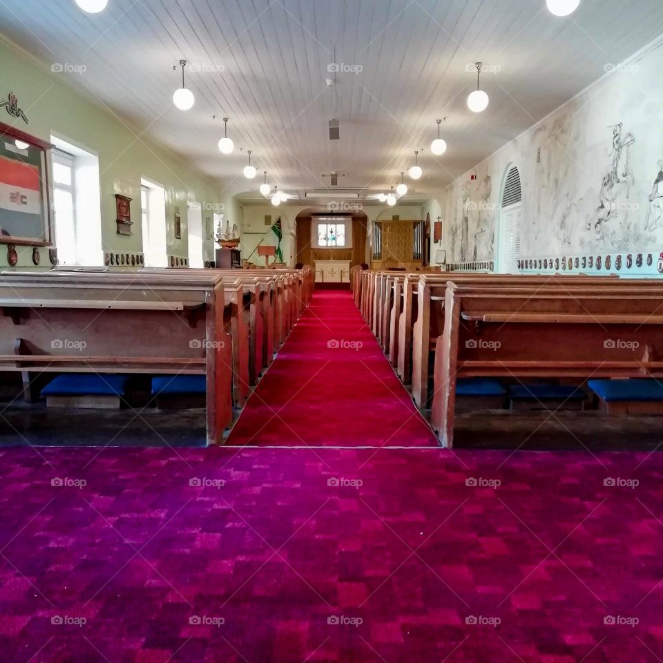 inside of a church sitting area