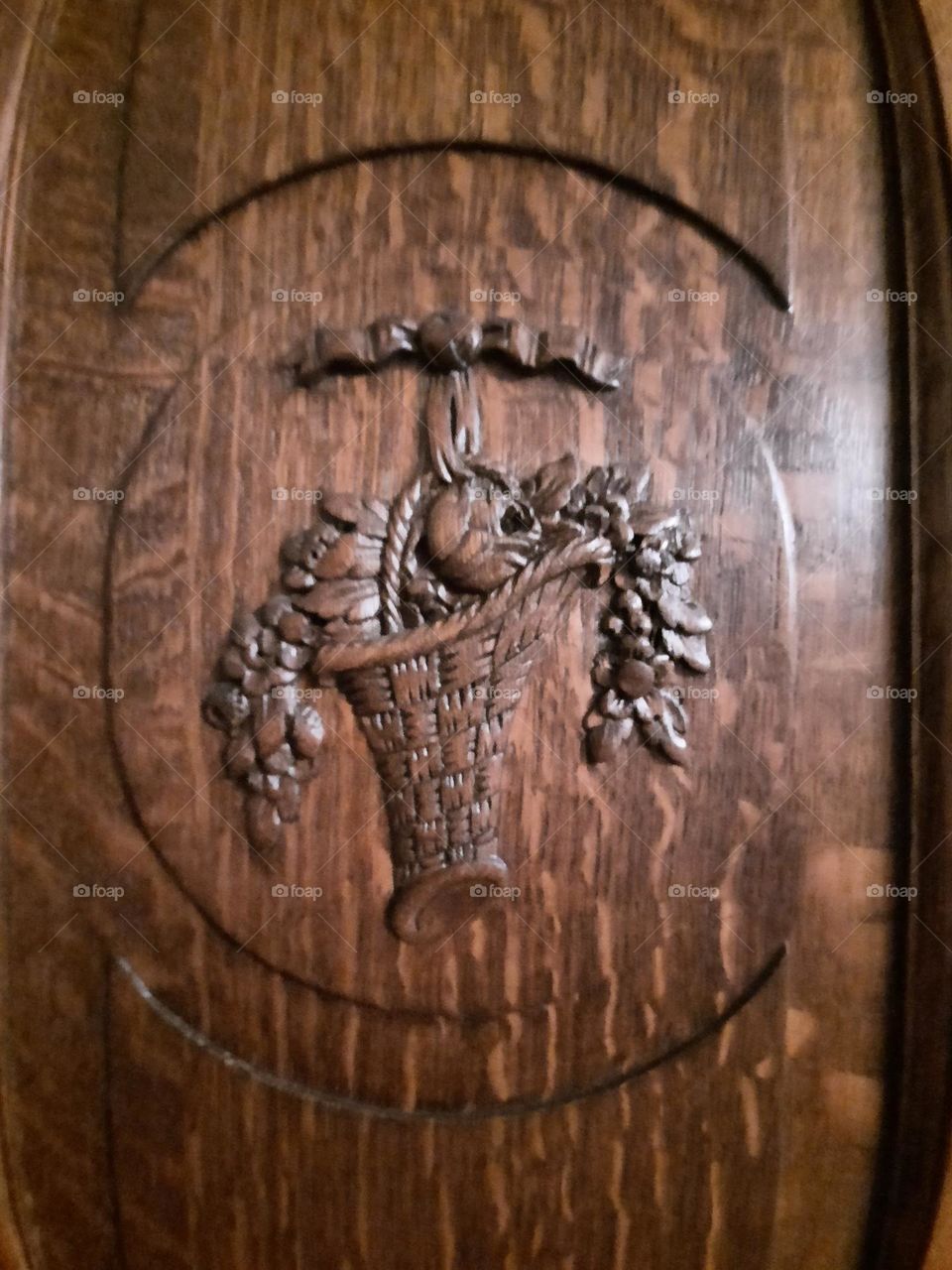 carved decoration on wardrobe wooden door