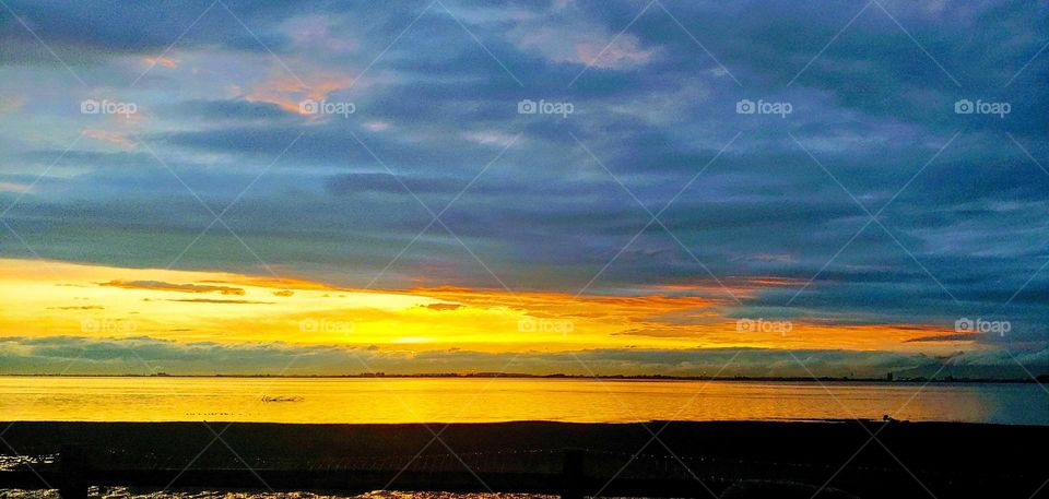 sunset reflections at the beach