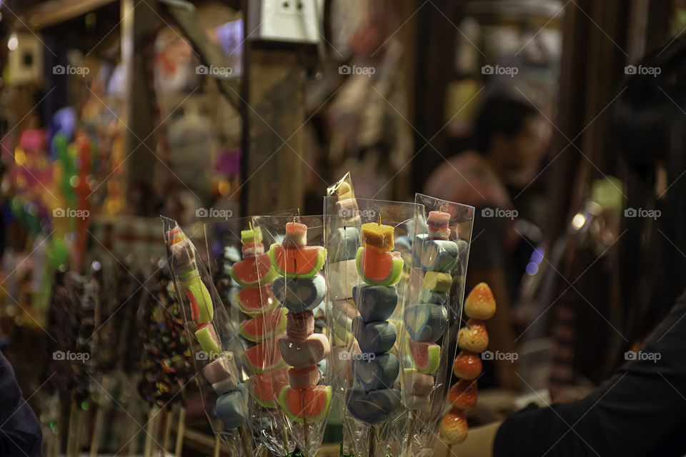 Jelly candy hearts and watermelon with beautiful color plug with bamboo.