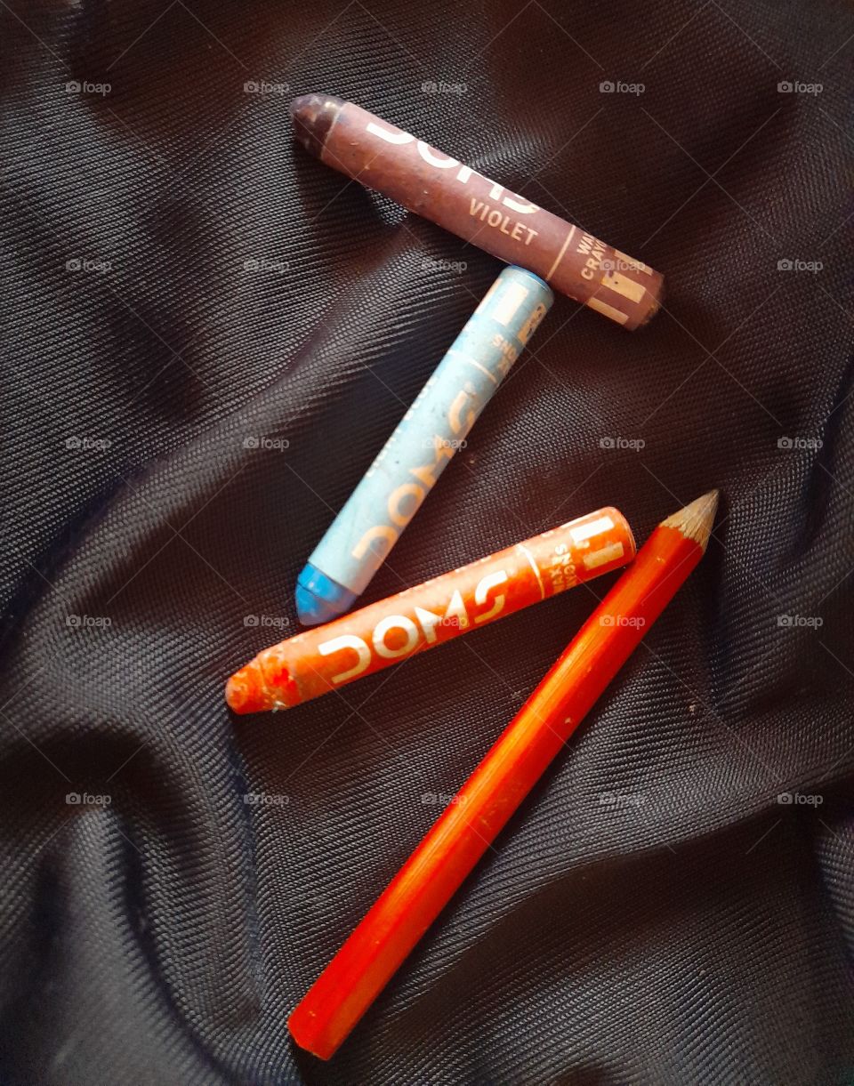 Doms crayons and pencil.