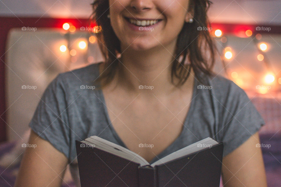 Young woman reading a book