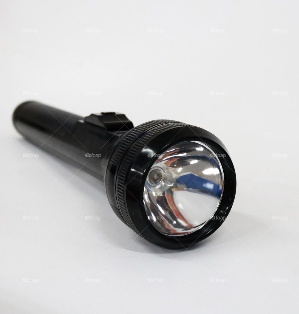 Flashlight photo on white background