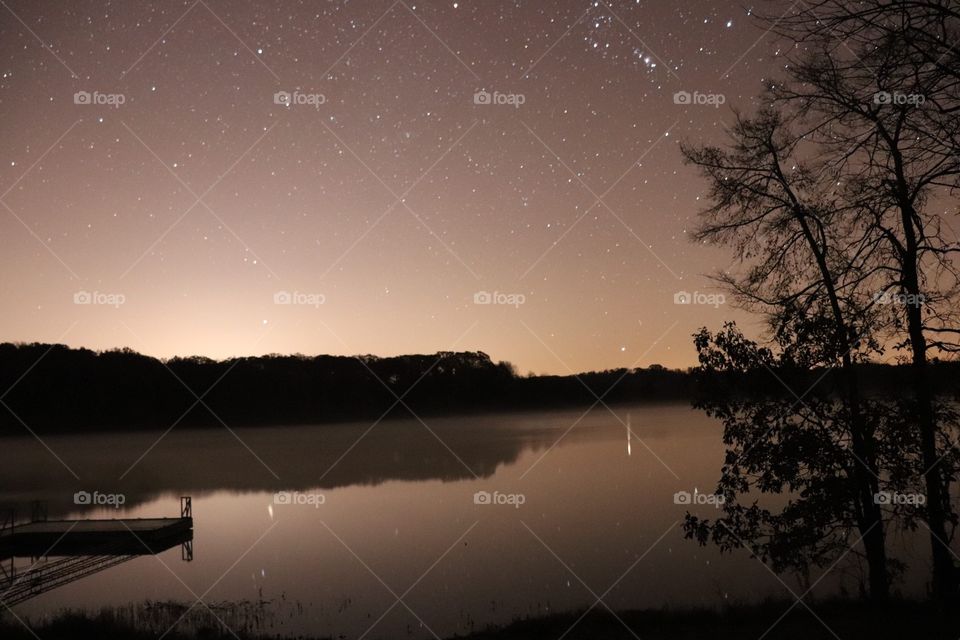 Tranquil lake scene in the middle of the night