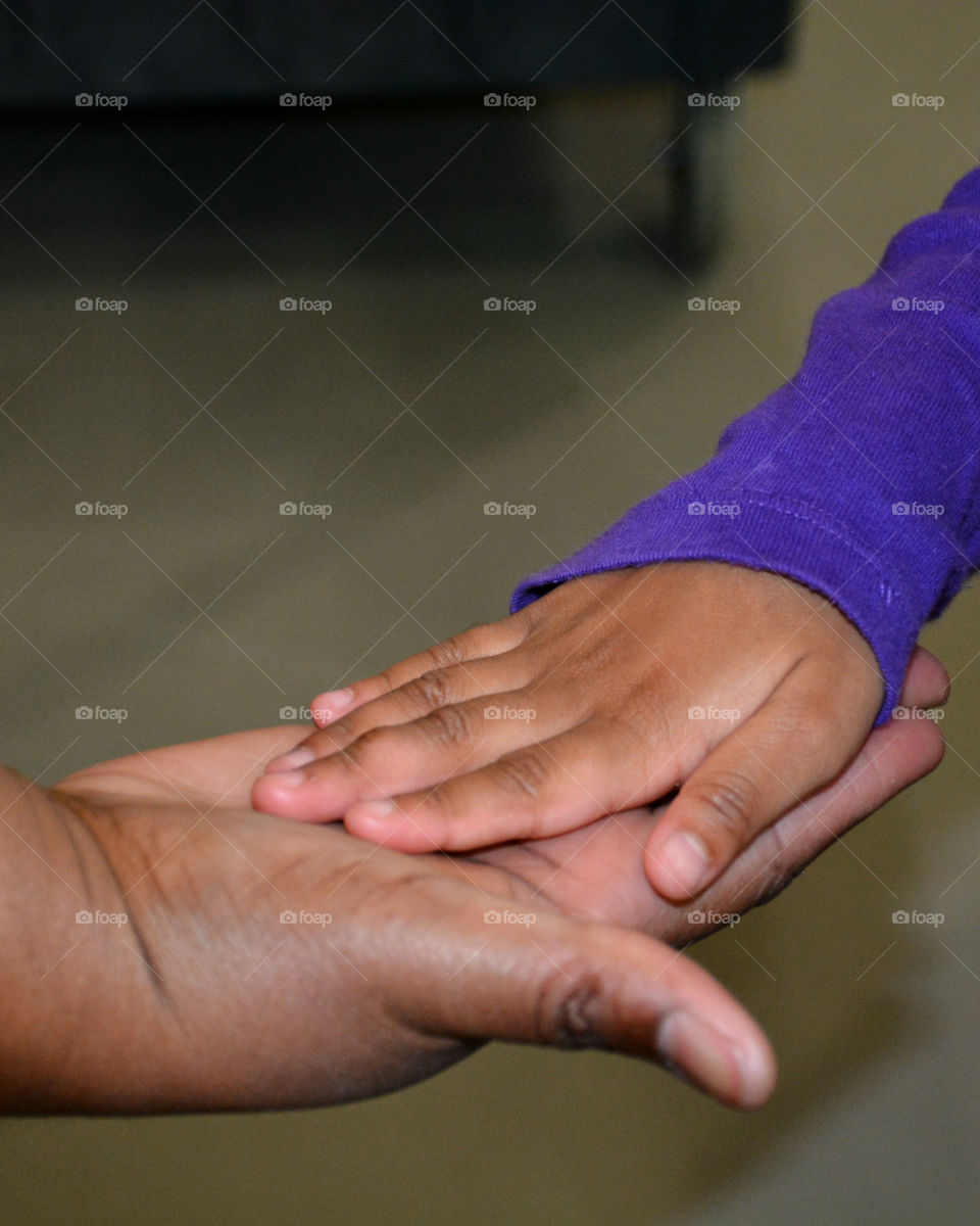 Close-up of holding hands