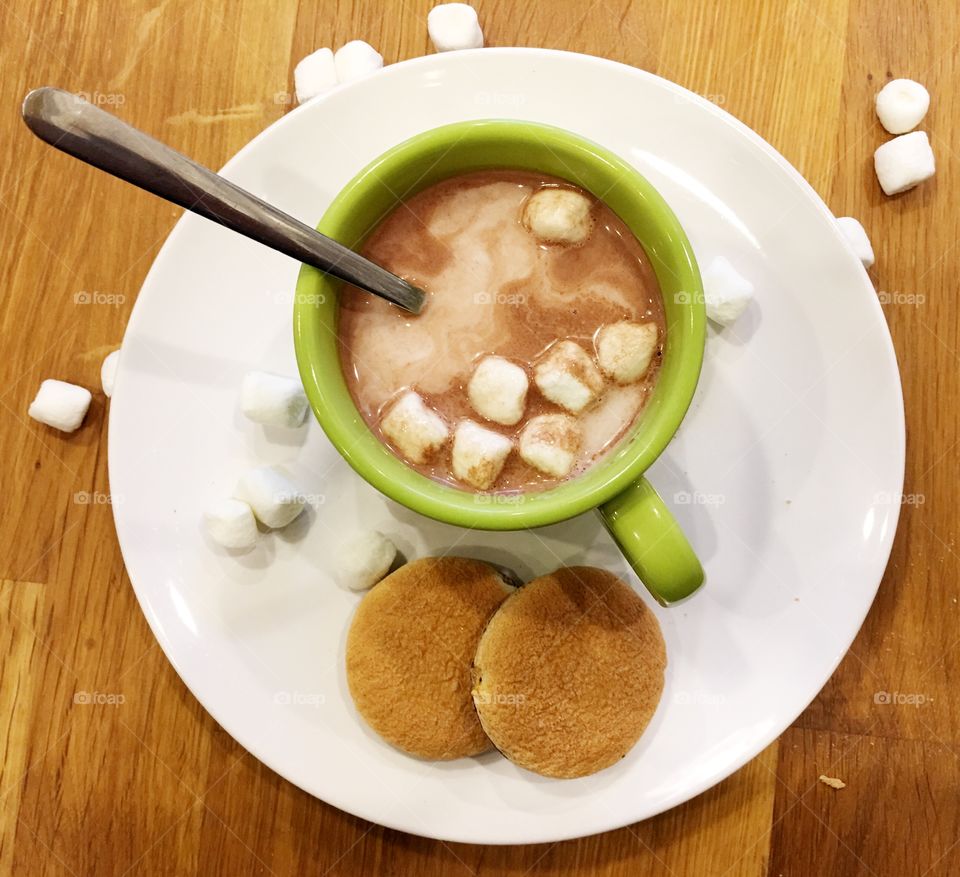 Close up of hot chocolate in a green cup