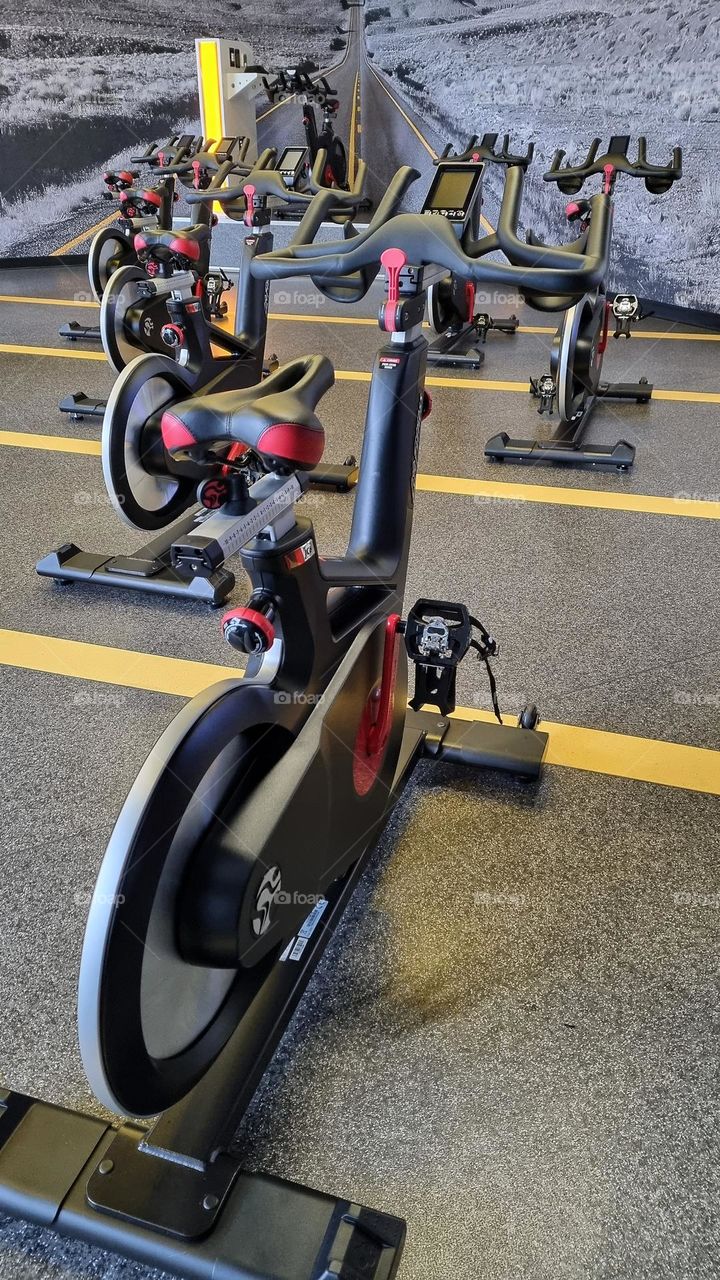 spinning bicycles in a gym studio