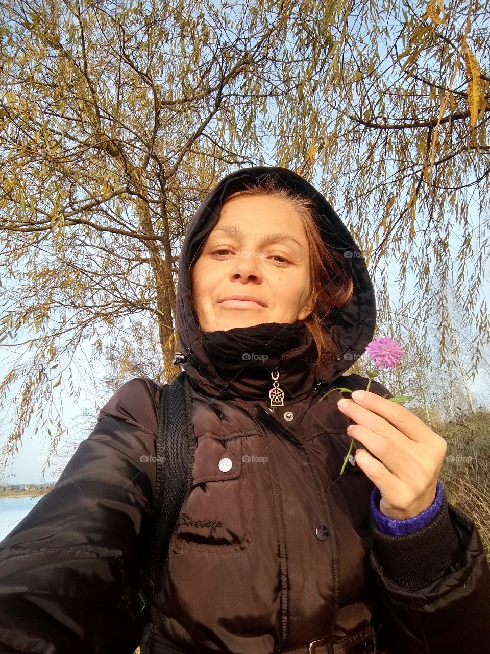 selfie girl on the nature with flower autumn time