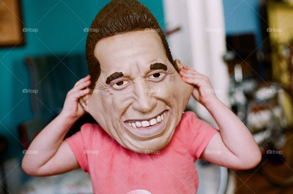 Child in Nixon mask