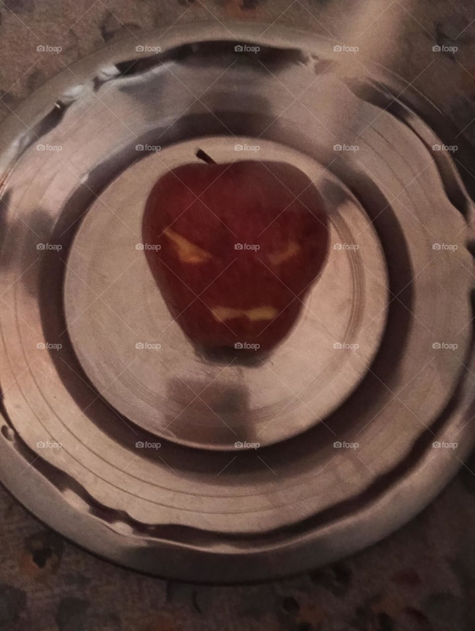 apple with angry face