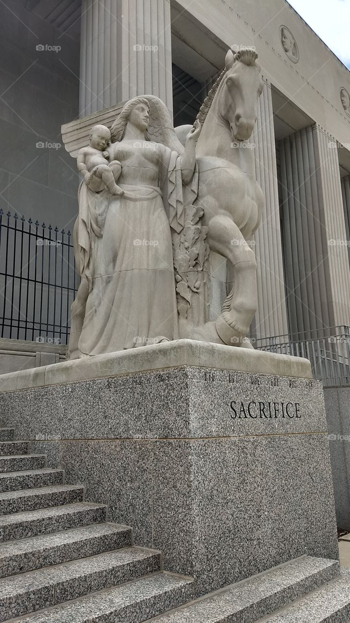 One of four statues standing at the entrances to the St. Louis Soldier's Memorial, a must-see monument and museum