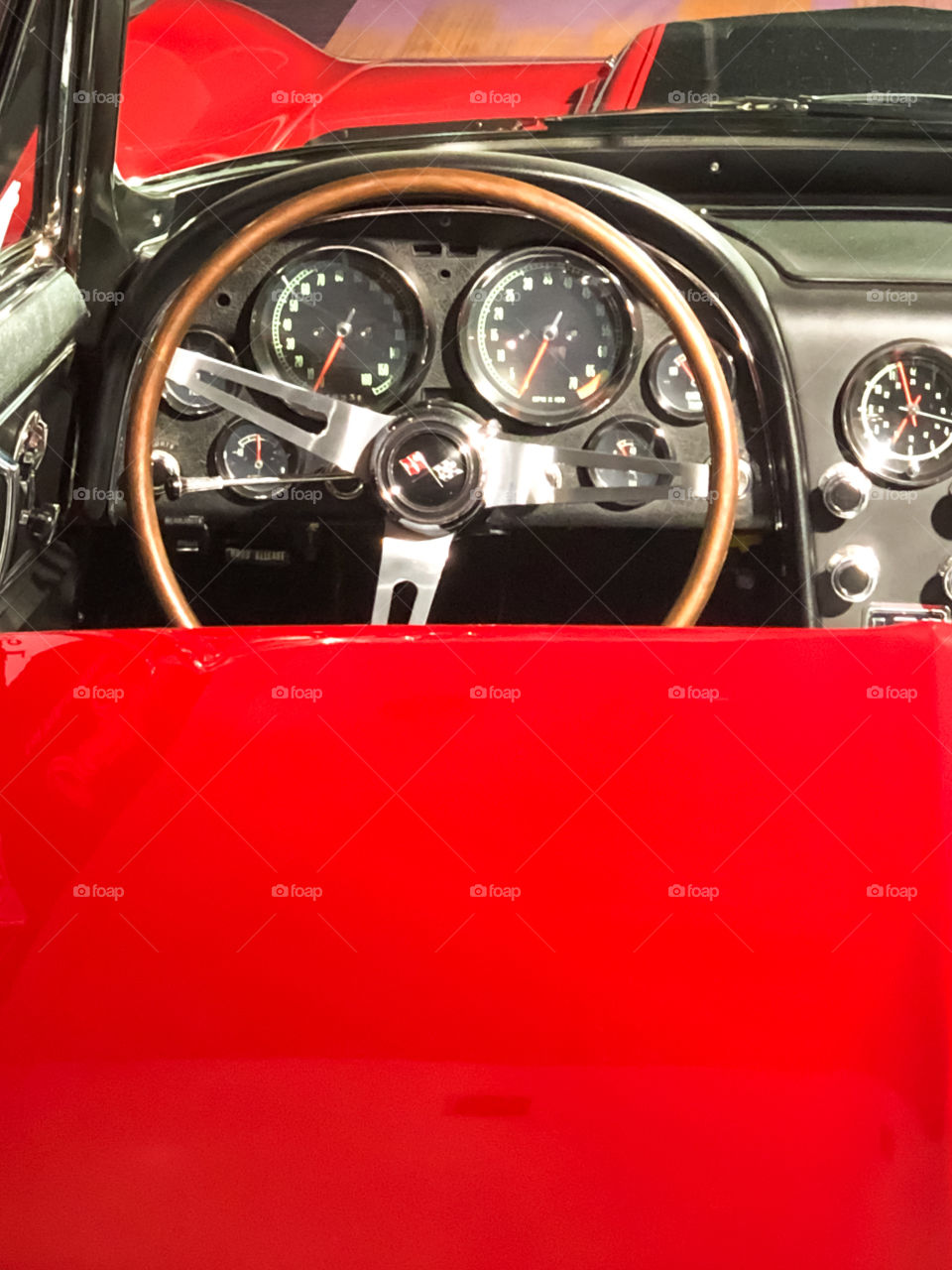 interior of red corvette convertable