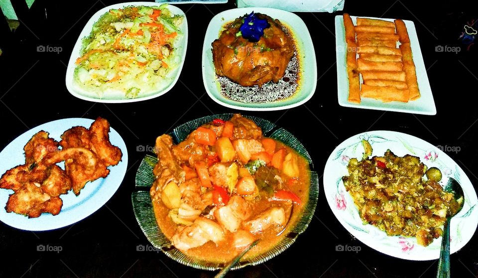 All time favorite Philippines dishes; adobo, fried chicken, Pansit, Meat sisig, lumpia and chicken ala king!