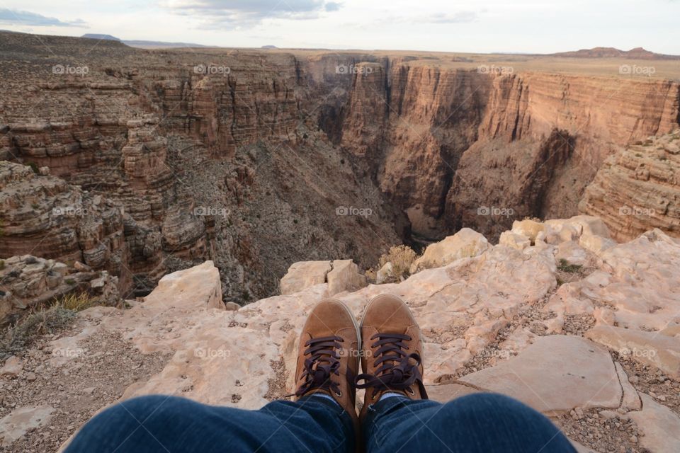 Standing at the edge of a canyon in Arizona
